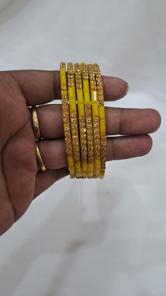 Appealing Yellow Color Stone Work Glass Bangles For women