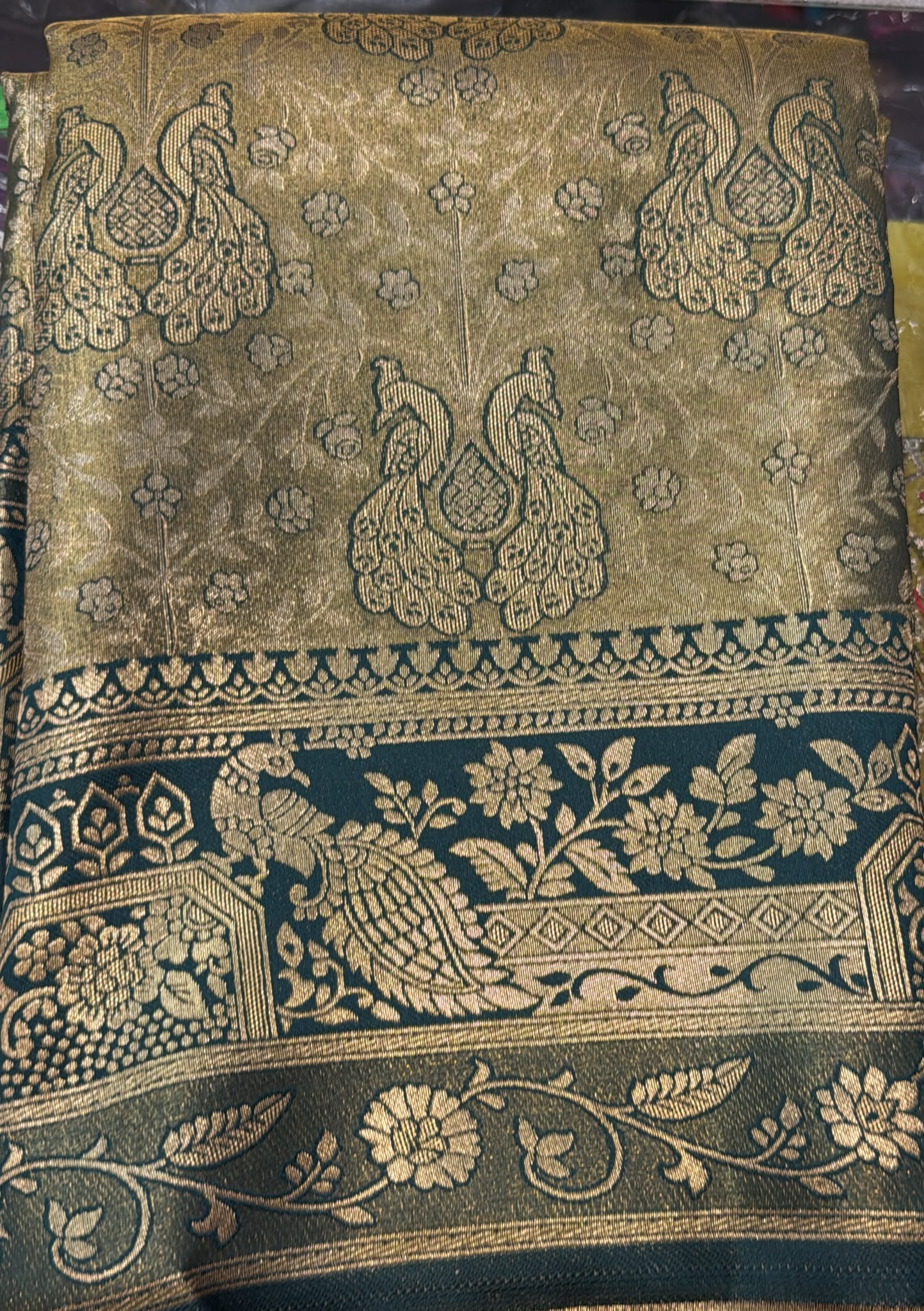 Stunning Dark Green Color Peacock Motifs Design Zari Work With Silk Saree For Women