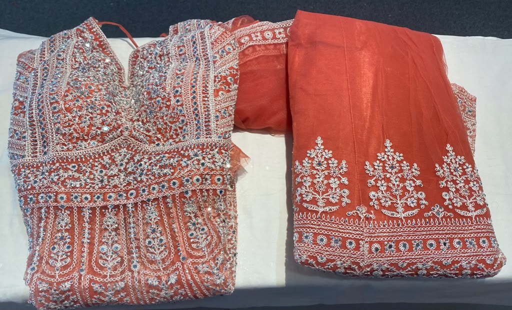 Attractive Peach And White Color Net Fabric With Embroidery Work Anarkali Style Lehenga For Women