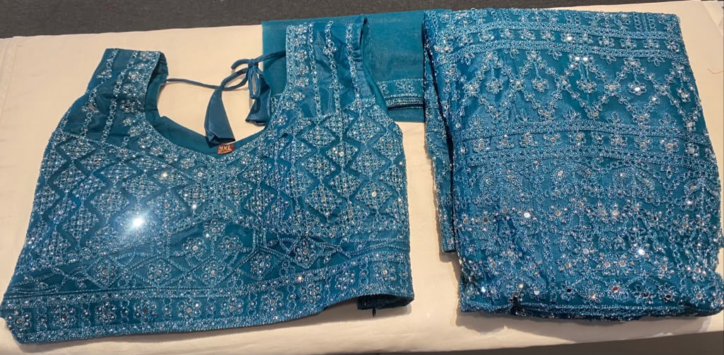 Gorgeous Teal Green Color Net Fabric With Embroidery Work Lehenga For Women