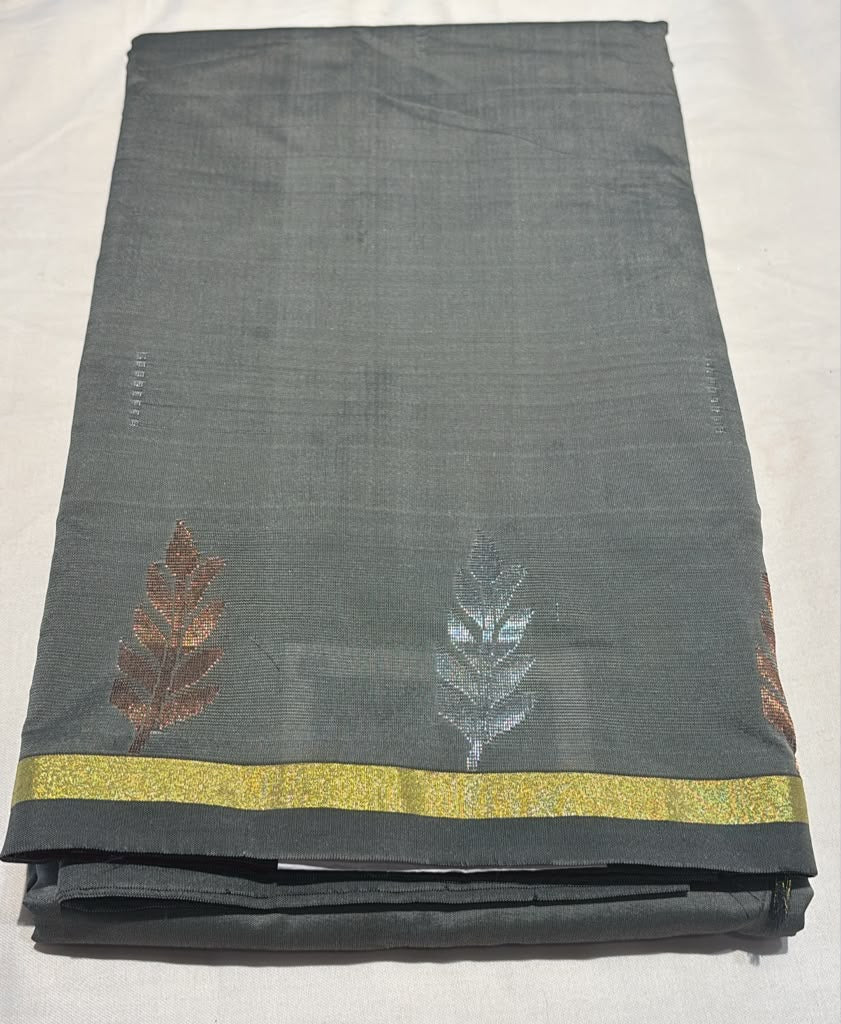 Appealing Gray Color Pure Kanchi Silk Saree With Leaf Motifs And Gold Zari Border For Women