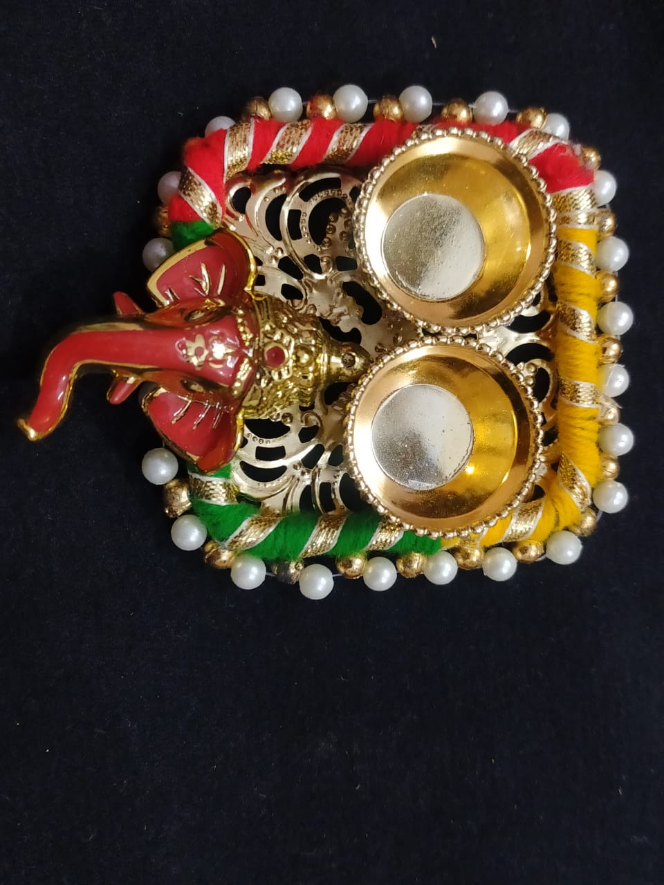 Attractive Multicolor Metal Ganesh Tikka Platter With Potli Bag