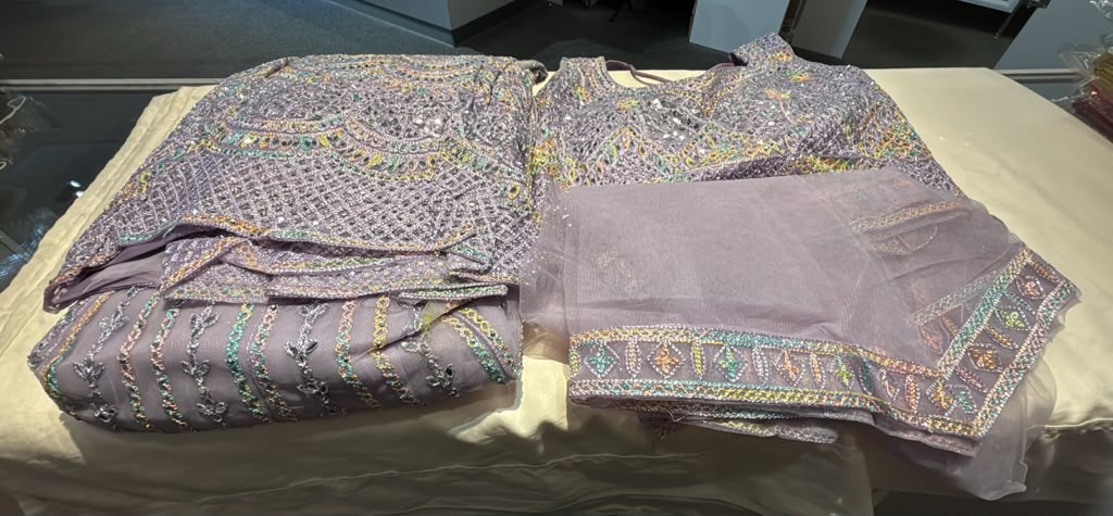 Terrific Lavender Color Net With Embroidery And Mirror Work Lehenga For Women
