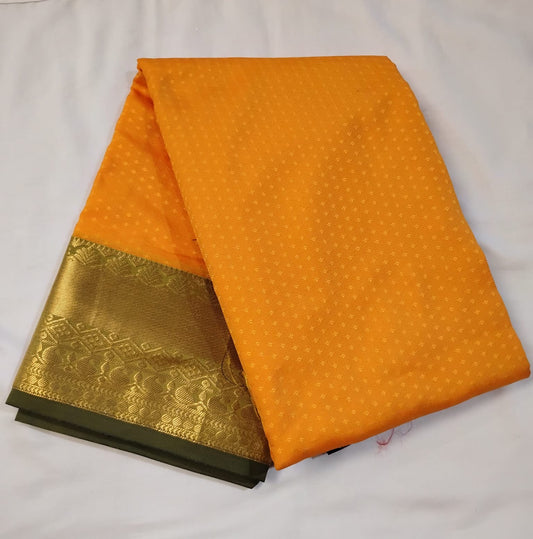 Wonderful Orange Color Pure Kanchi Silk Saree With A Contrast Color Zari Work Border For Women