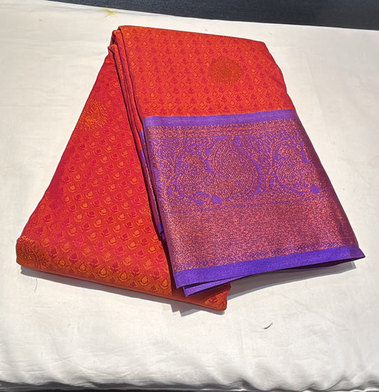 Premium Orange Color Pure Kanchi Silk With Elegant Purple Color Motifs Border And Gold Zari Work Saree For Women