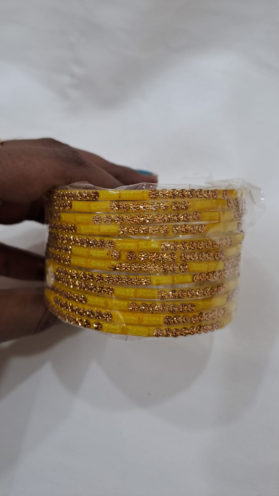 Appealing Yellow Color Stone Work Glass Bangles For women