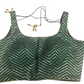 Dazzling Green Color Party Wear Silk Sleeveless Back Open Blouse
