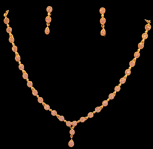 Alluring Pink Color Stone Studded Gold Plated Necklace With Earrings Set