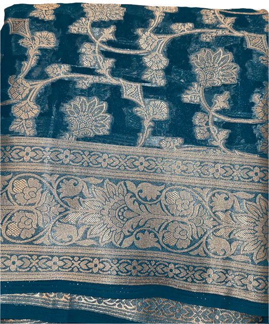 Attractive Blue Color Banarasi Silk Saree With Silver Flower Design And Grand