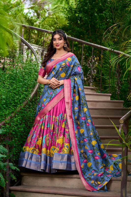 Alluring Blue Colored Kalamkari Print With Zari Weaving Border Lehenga Choli With Dupatta