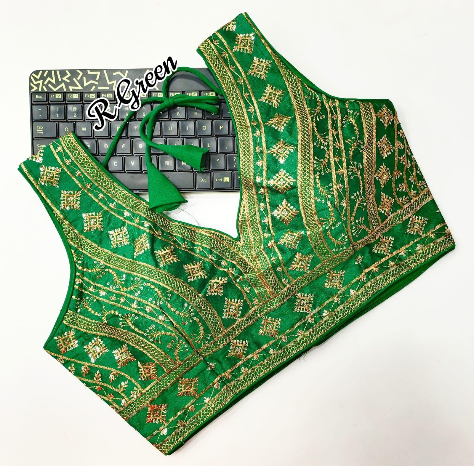 Stunning Green Color Fentam Silk Back Open Ready Made Blouse With Zari Embroidery Work