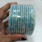 Pleasant Sky Blue Color Checked Design Glass Bangles For Women