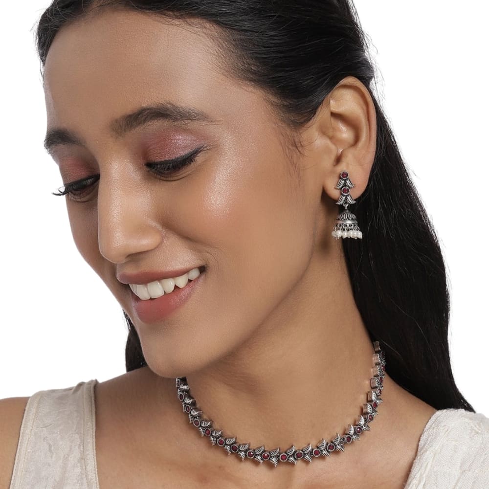 Fascinating Silver Oxidized Ruby Stone Studded Vintage Design Sleek Necklace Set With Jhumka Earrings