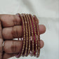 Attractive Maroon Colored Glass Bangles With Sparkling Stone Near Me