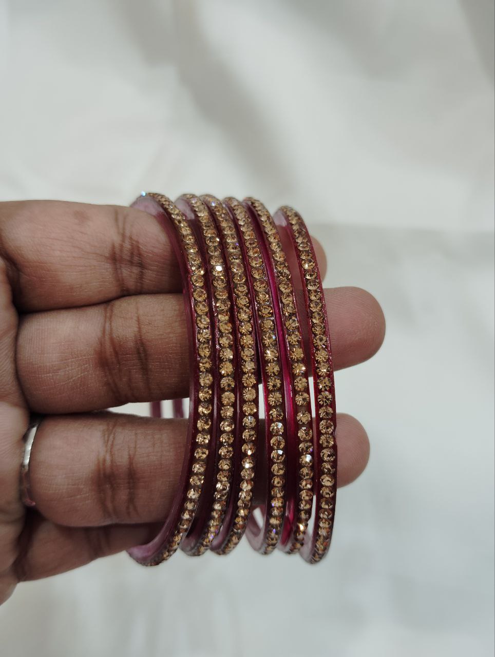 Attractive Maroon Colored Glass Bangles With Sparkling Stone Near Me