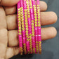 Alluring Rani Pink Color Stone Work Glass Bangles For Women