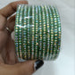 Alluring Green Color Checked Design Glass Bangles For Women