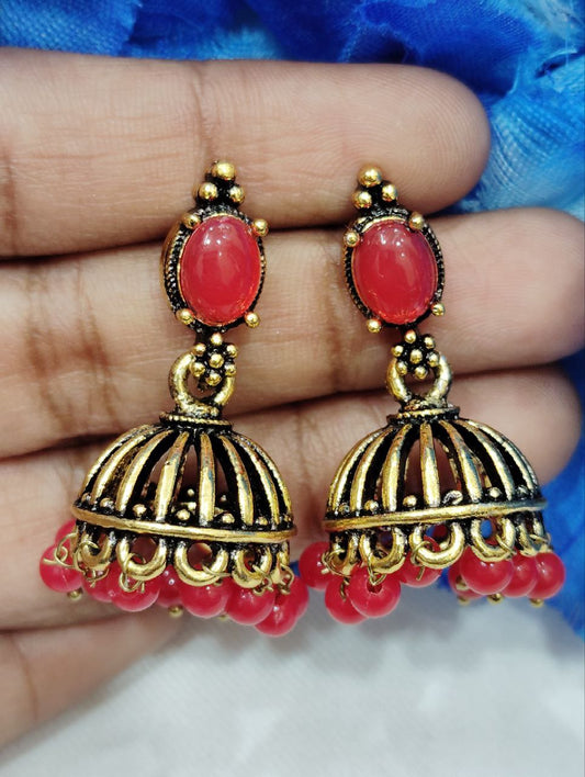 Appealing Red Color Antique Gold Jhumka Earrings For Women