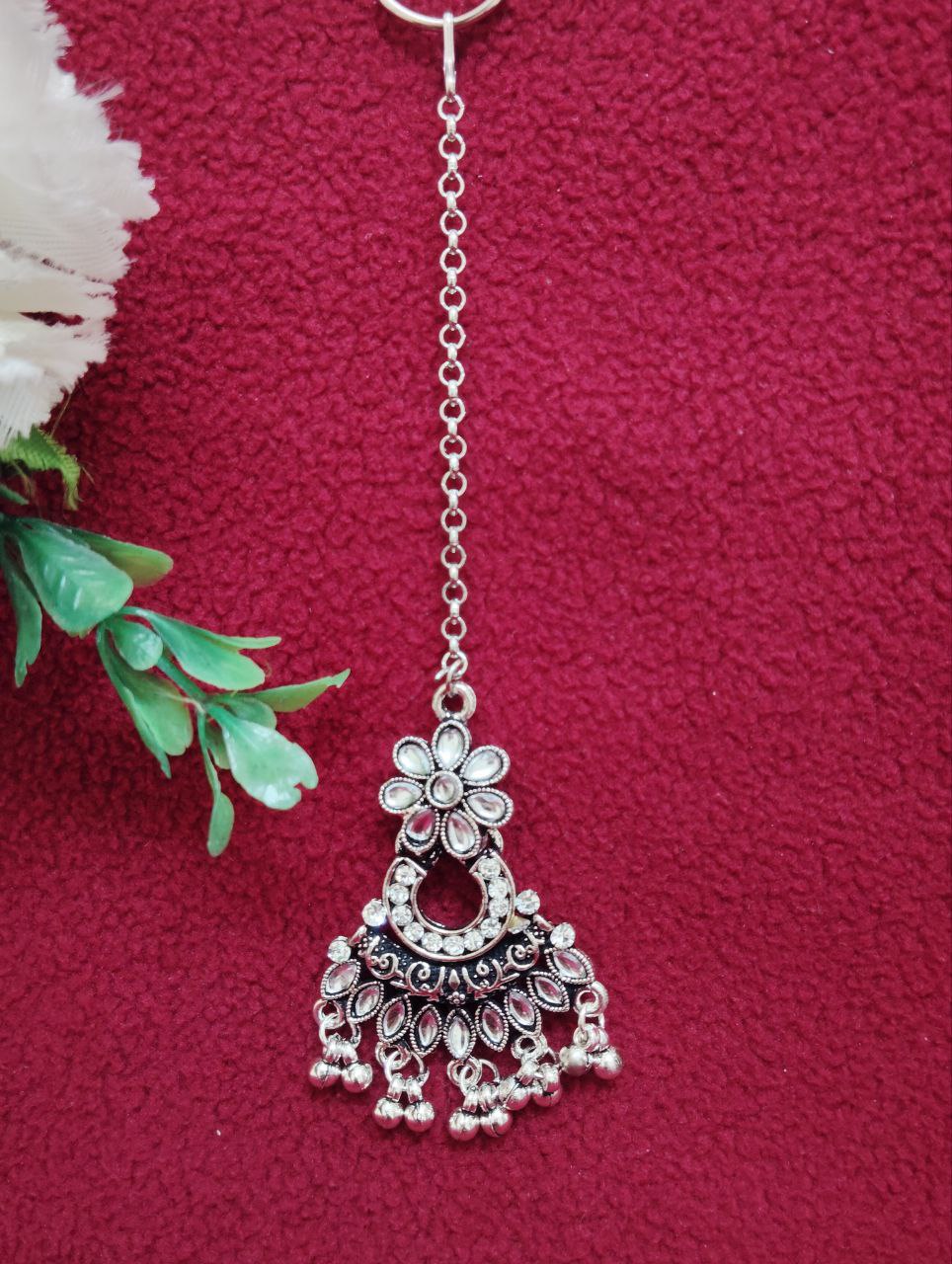 Alluring White Colored Beautiful Oxidized gold plated tikka In Near Me