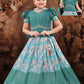Gorgeous Teal Green Color Embroidery And Mirror Work Silk Langa Sets For Girls
