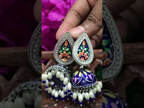 Attractive Blue Enameled Floral Design Silver Oxidized Jhumka Earrings With Pearl Drop