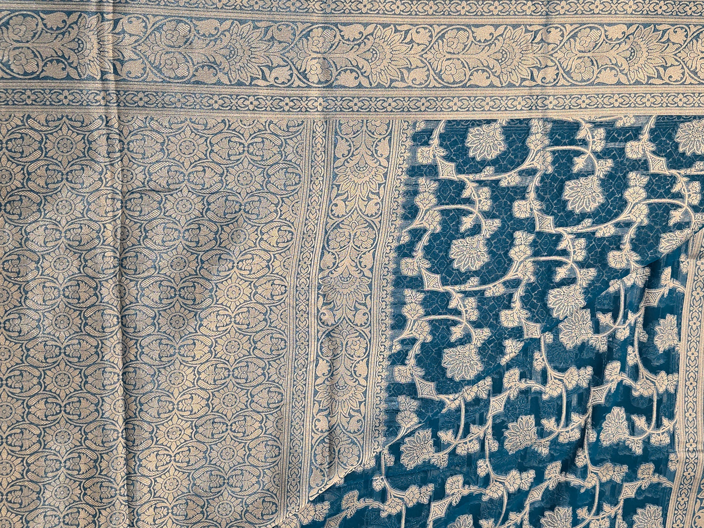 Attractive Blue Color Banarasi Silk Saree With Silver Flower Design And Grand