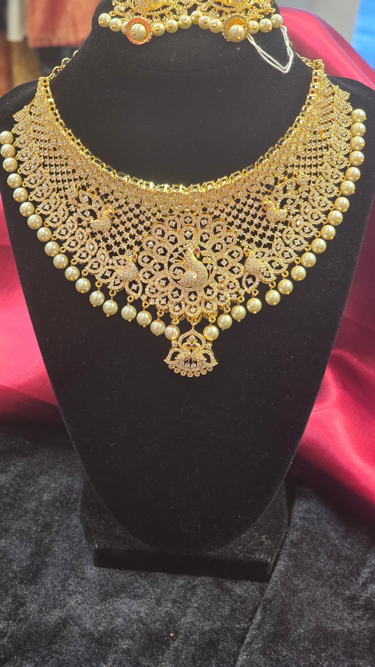 Elegant Gold Color Choker Set With Embedded Peacock Design And Earrings For Women