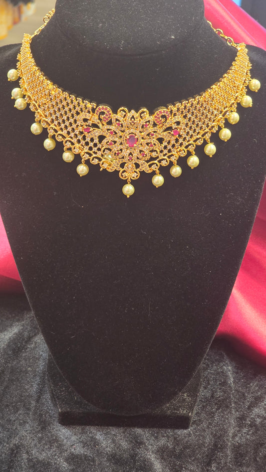 Mesmerizing Golden Color Choker Set With Ruby Stone And Earrings For Women