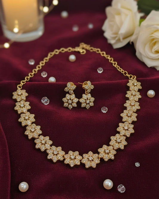 Fabolous White Stones Studded Flower Shaped Gold Plated Necklace With Earrings Set