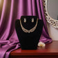 Elegant looking fancy gold plated necklace with white stones.
