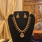 Beautiful gold plated flower shaped necklace set with white, green and pink stones and also pearls.