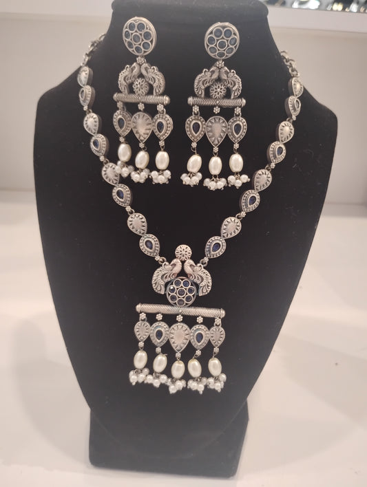 Alluring Dark Blue Color Stone With pearl Oxidized Necklace And Earrings For Women