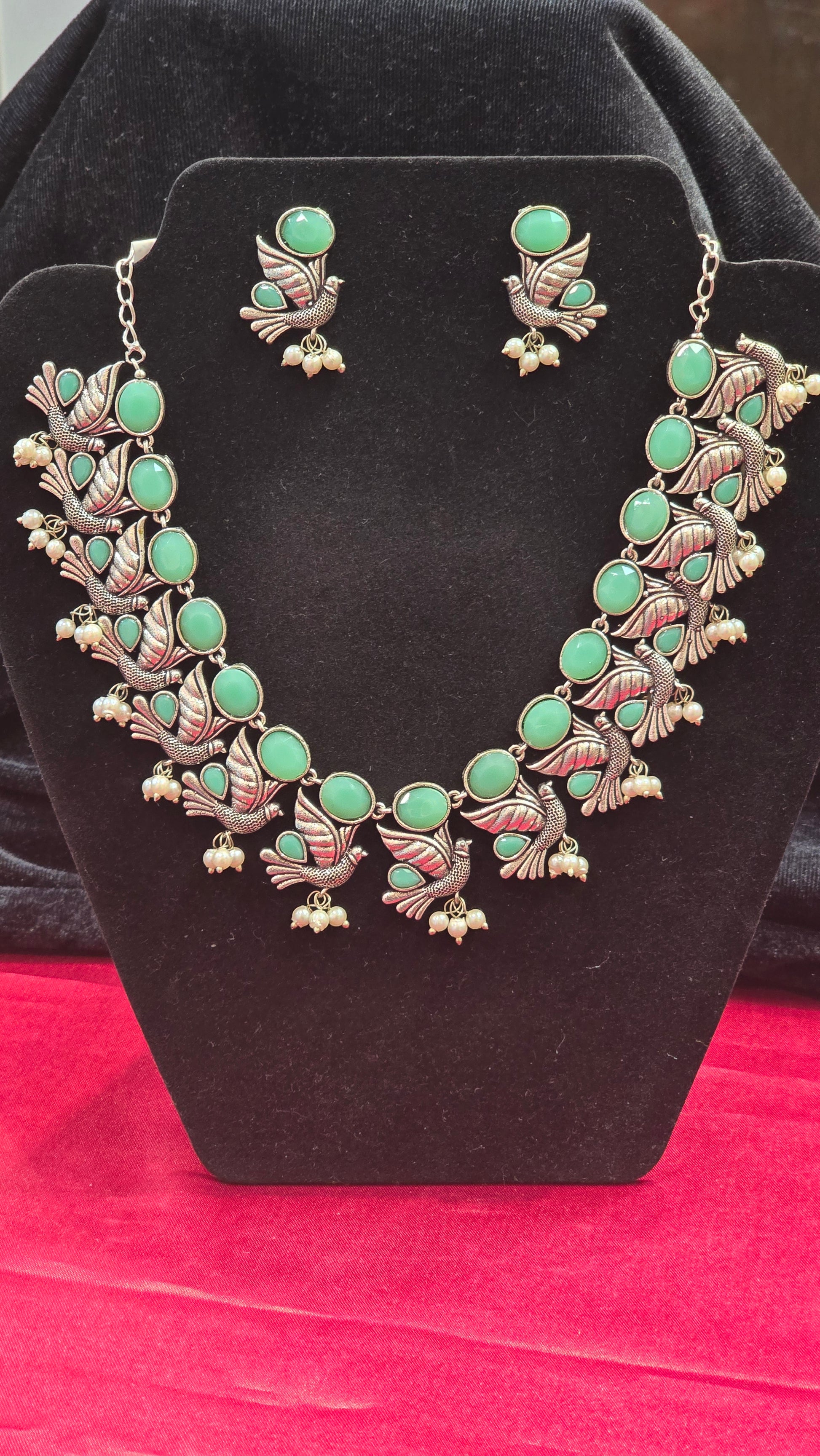 Wonderful Pista Green Bird Shaped Necklace Set