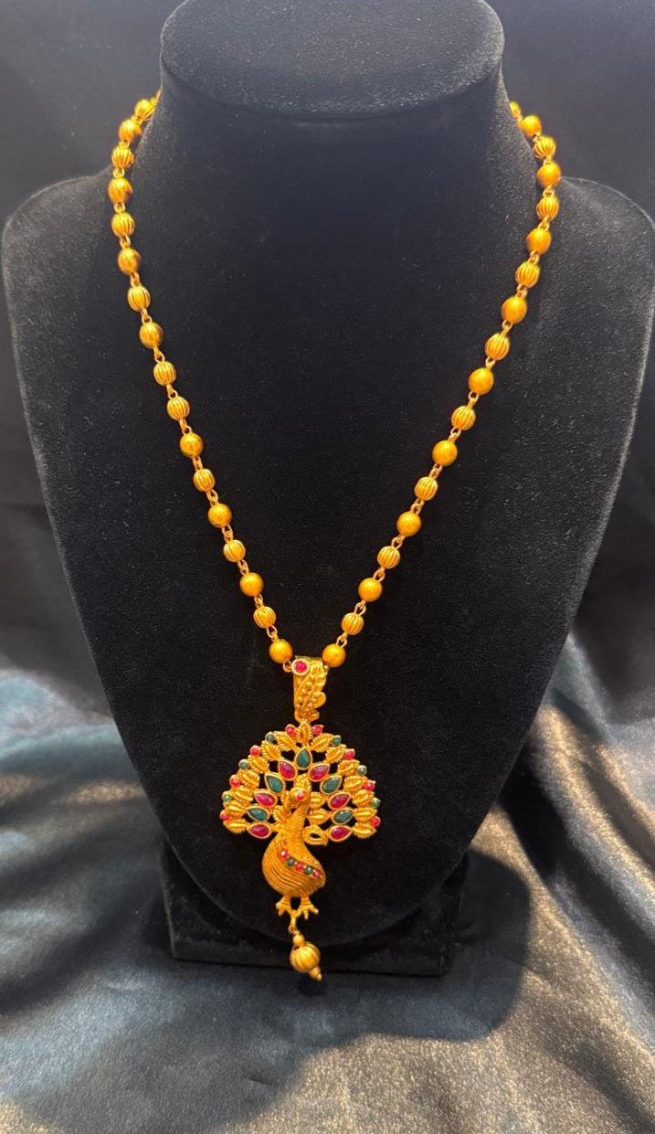 Gorgeous Gold Plated With Matt Finish Peacock Shaped Dark Pink & Green Stones Necklace And Earrings Set