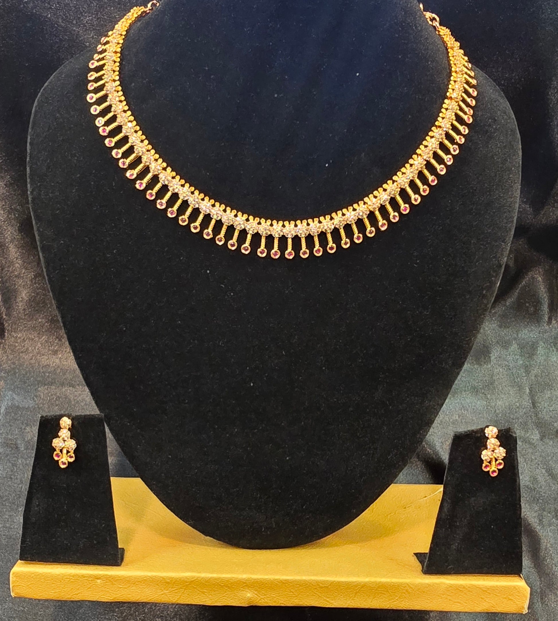 Alluring Dark Pink Color And White Stone Gold Plated Necklace With Earrings Set