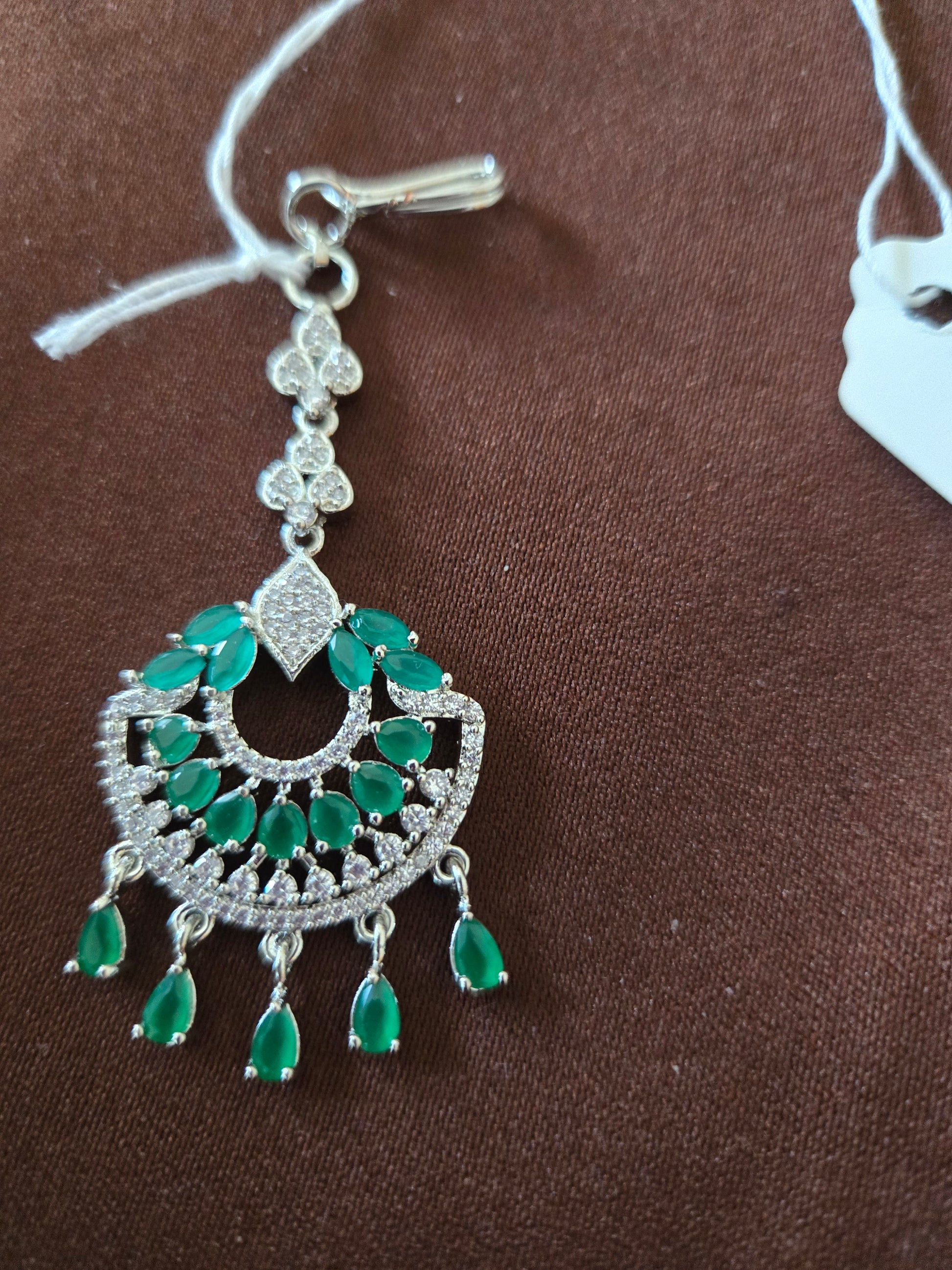 Dazzling Party Wear AD Green Color Stone Maang Tikka For Women