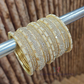 Charming White Color Stone Gold Plated Bangles For Women