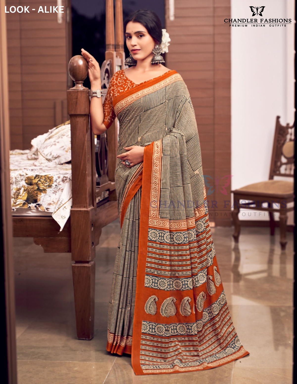 Beautiful Black And Orange Color Border Mul Mul Cotton With Rich Pallu And Printed Work Saree