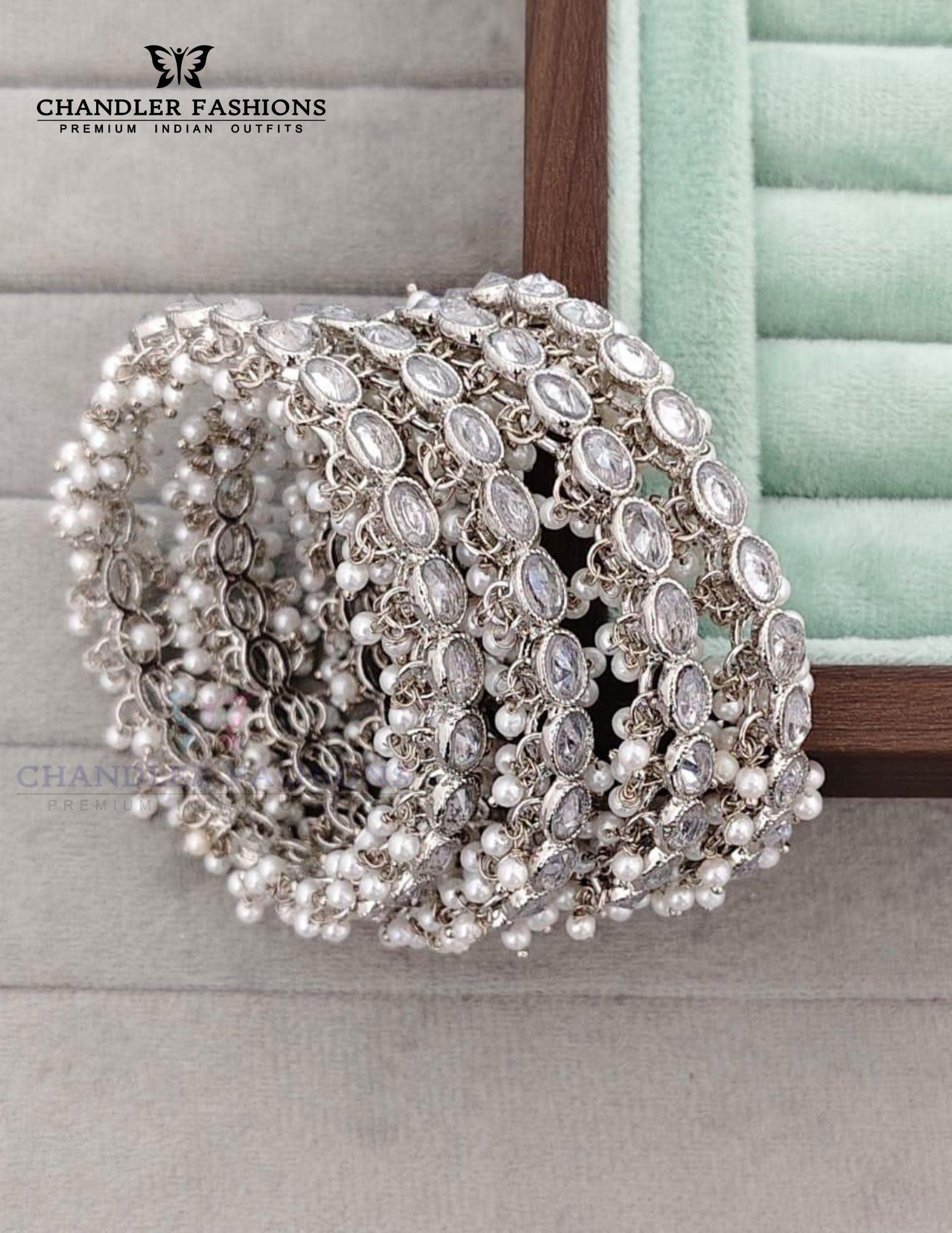 Beautiful White Color Stone Pearls And American Diamond Bangles Set For Women