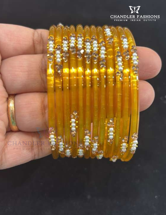Fantabulous Orange Colored Glass Bangles For Women