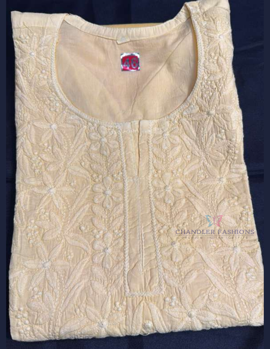 Charming Yellow Color Rayon With Embroidery Work Short Kurti For Women