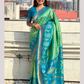 Attractive Green And Blue Ethnic Motifs Woven Design Zari Handloom Patola Saree For Women
