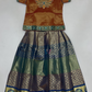 Wonderful Orange And Green Color Art Silk Langa Set With Stone And Zari Work For Girls