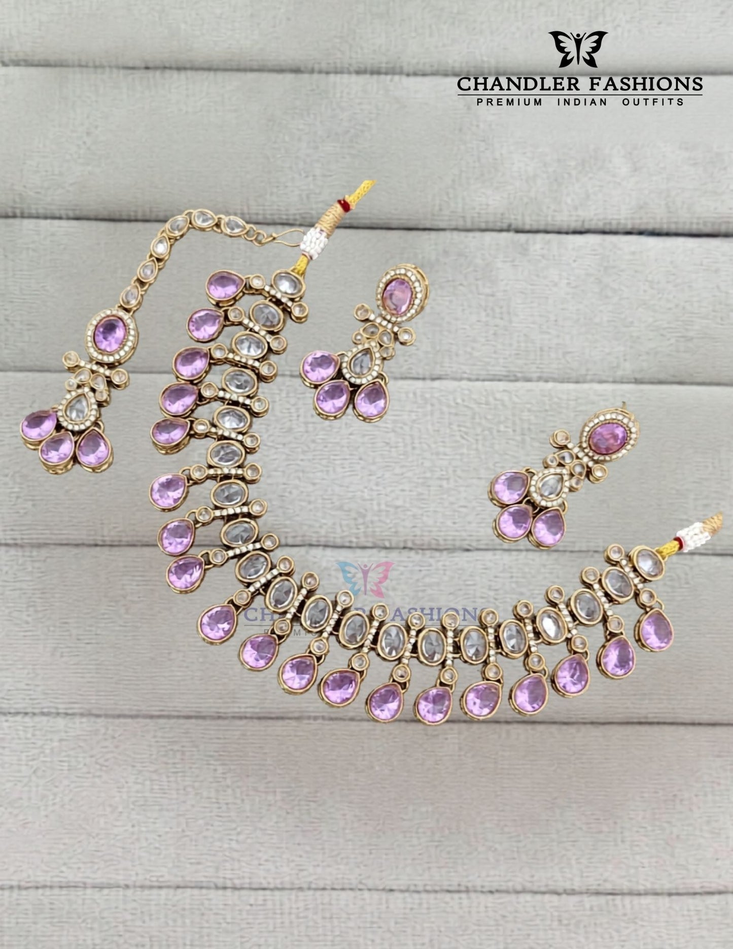 Elegant Gold Plated Light Pink Color Kundan Necklace With Earrings And Maang Tikka