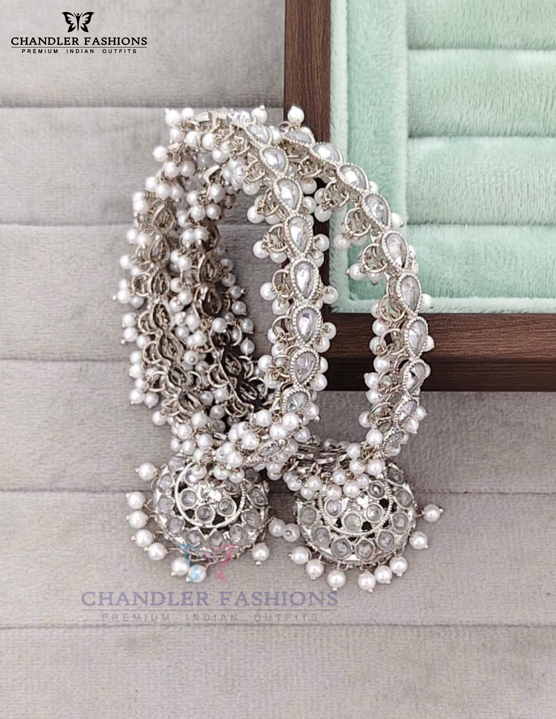 Gorgeous White Color Stones And Pearls With Jumkha Design American Diamond Bangles For Women