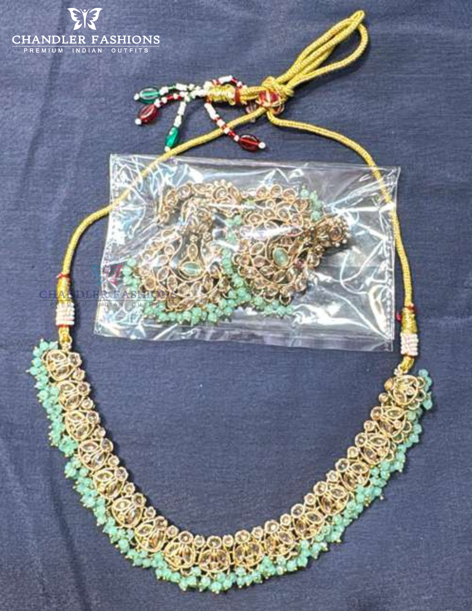 Delightful Light Green Color Beads And Gold Stones Necklace With Earrings And Maang Tikka