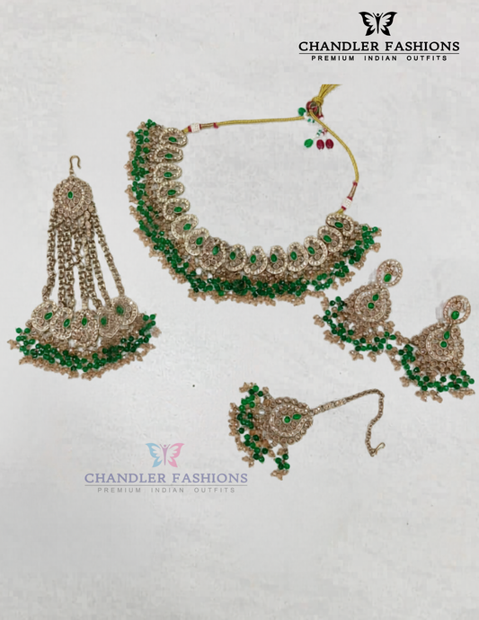 Elegant Antique Gold Green Color Kundan Necklace With Earrings And Maang Tikka