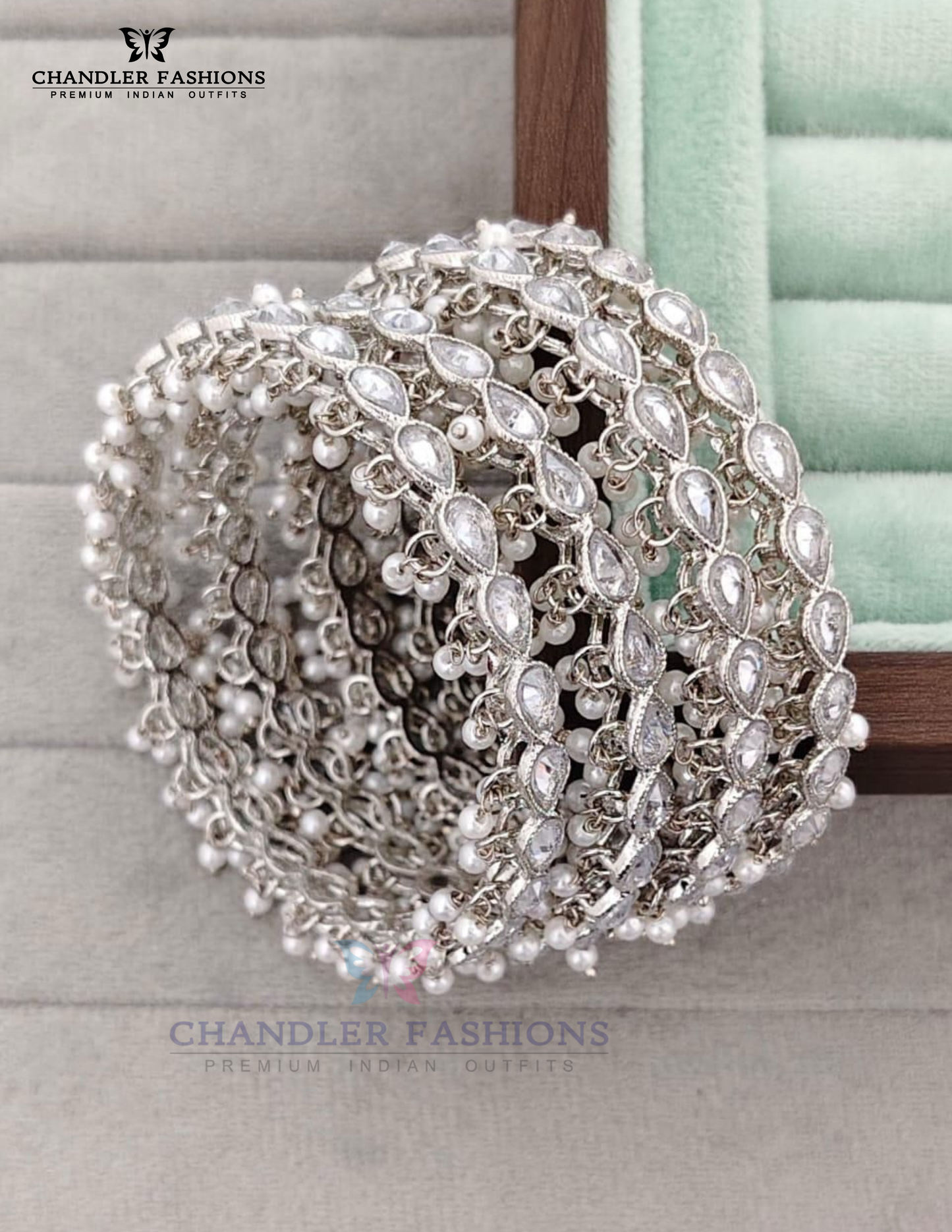 Stunning White Color Stones And Pearls American Diamond Bangles For Women