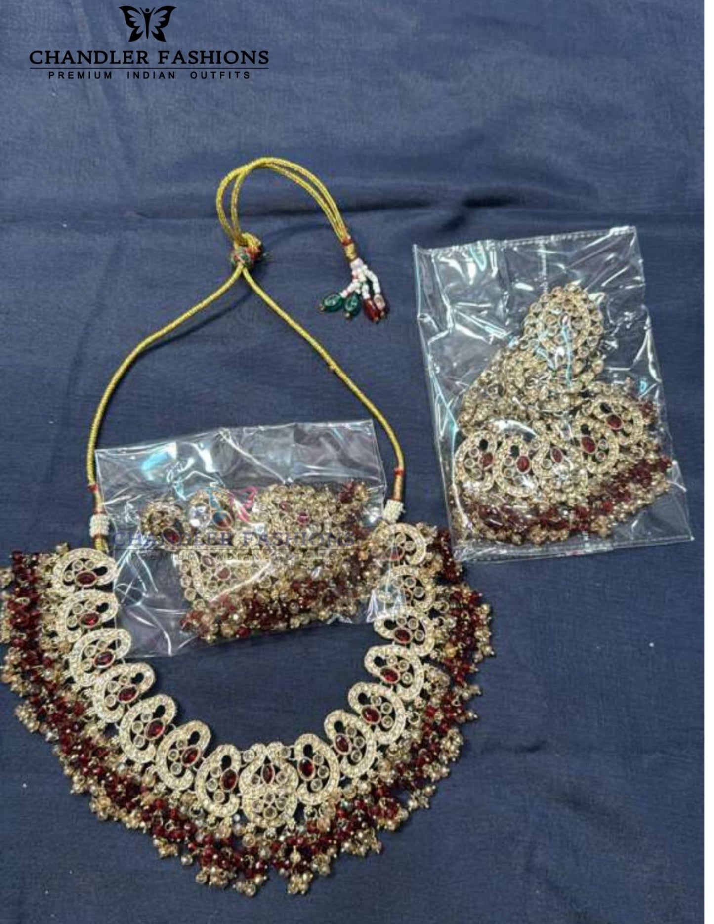Lovely Antique Gold Red Color Kundan Necklace With Earrings And Maang Tikka