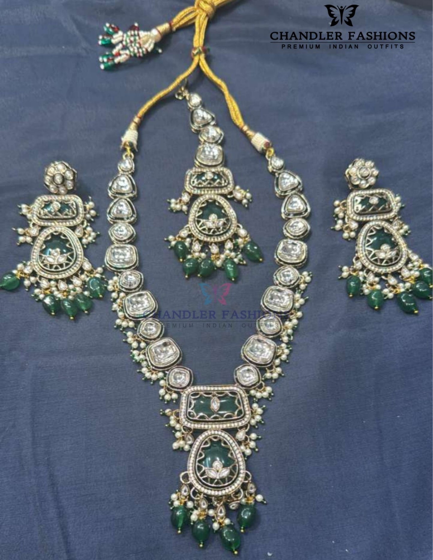 Ravishing White And Green Color Pearl Kundan Necklacs With Earrings And Maang Tikka
